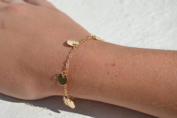 Gouden armband met ronde bedeltjes