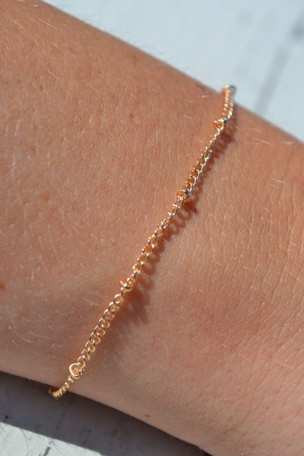 Gouden armband met balletjes